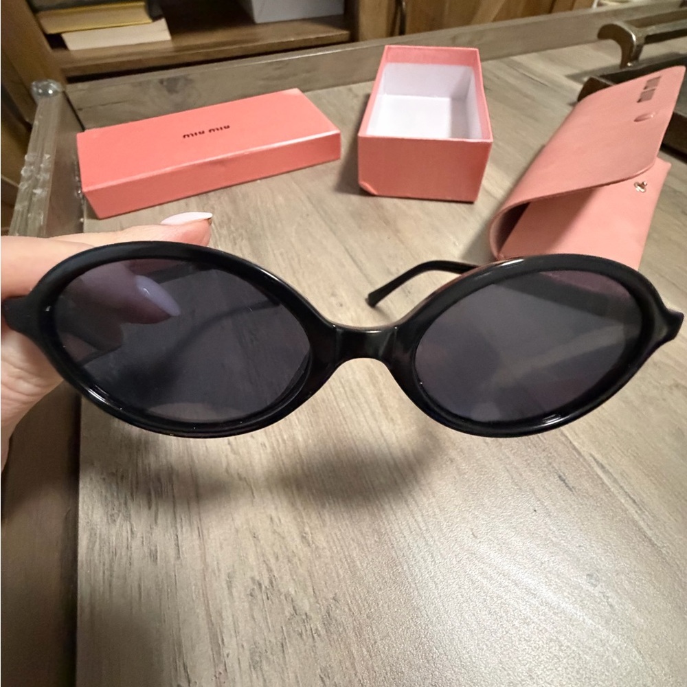 Miu Miu Black Oval Sunglasses